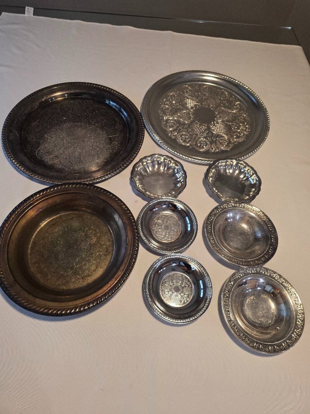 Silver plated serving platters and bowls